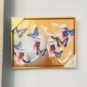 Chanel Coco Mademoiselle butterfly gold framed wall art